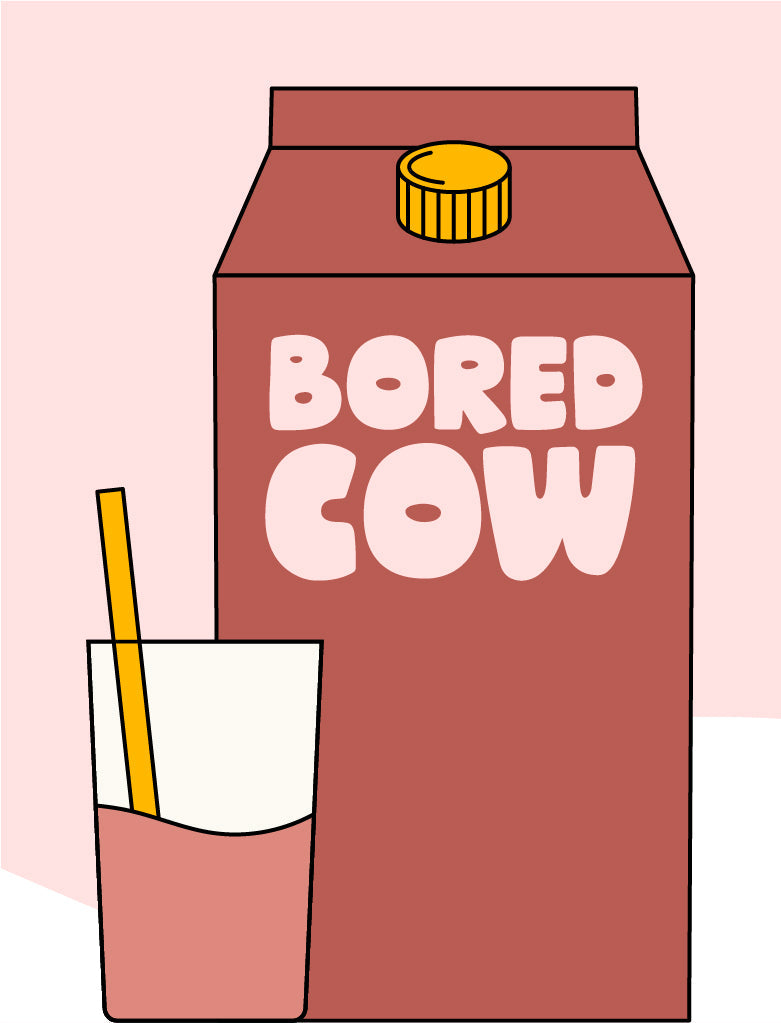 "A brown carton of Bored Cow animal-free dairy milk and a glass full of chocolate milk with a straw."